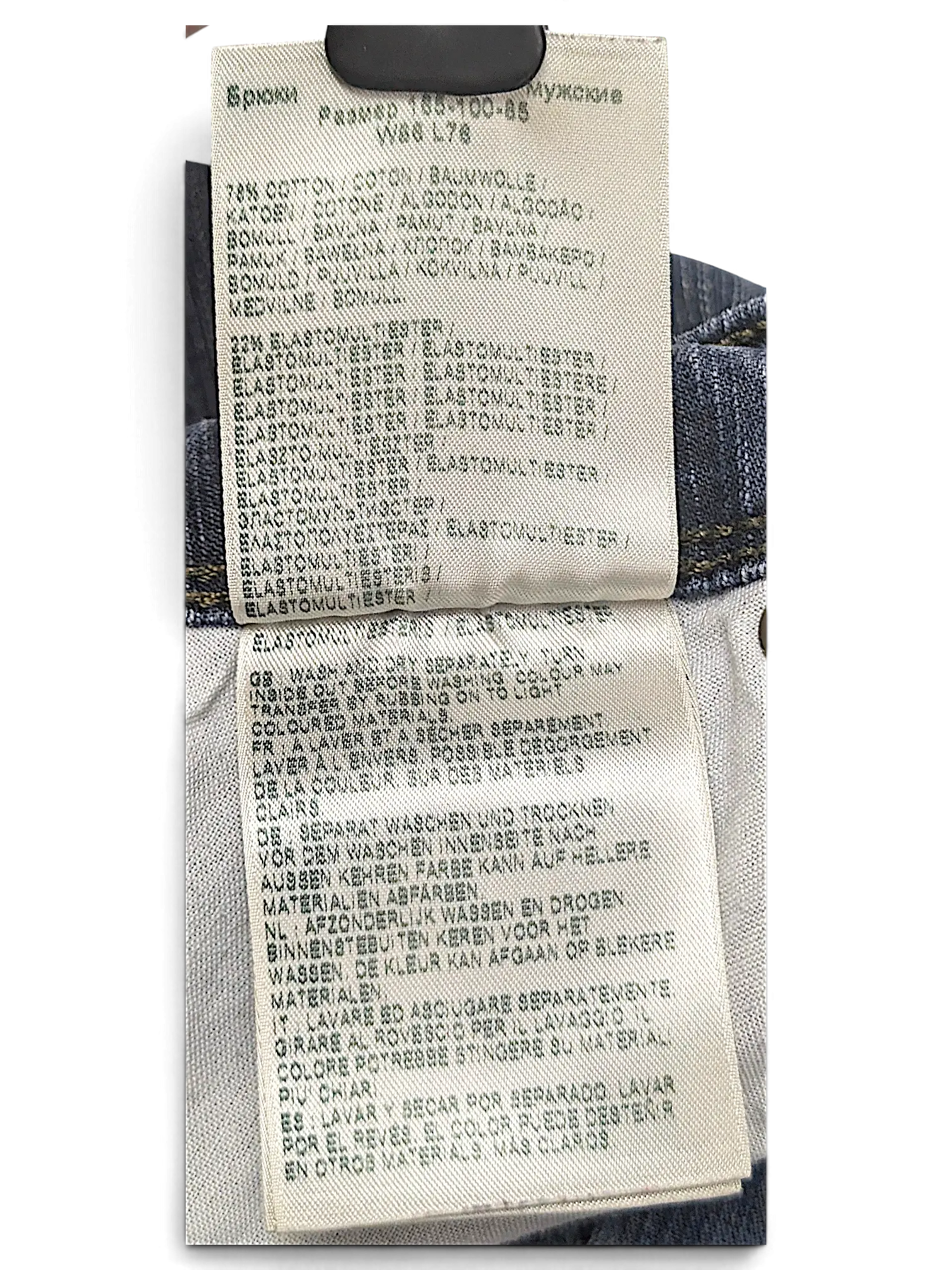 JAKE & IPI Wrangler jeans care label showing cotton and elastomultiester fabric composition and washing instructions