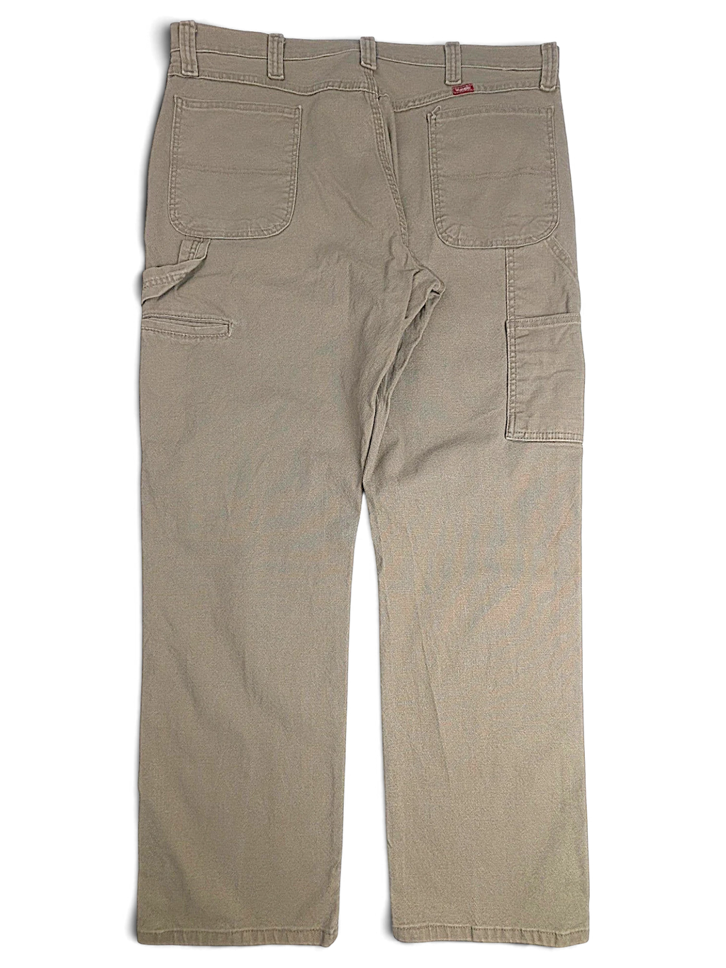 JAKE & IPI Wrangler khaki beige carpenter pants with utility pockets and straight leg fit in stretch cotton.