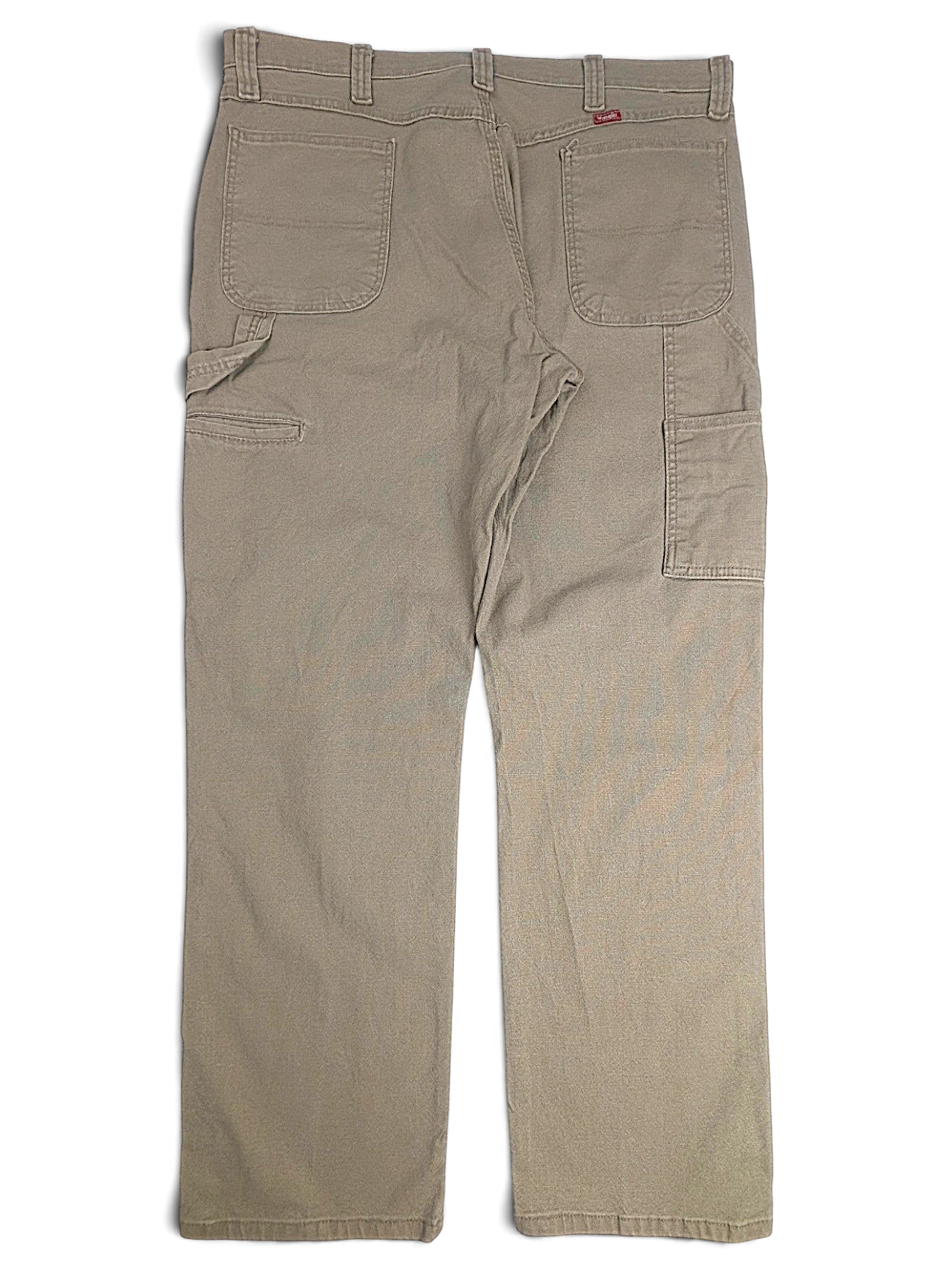 JAKE & IPI Wrangler khaki beige carpenter pants with utility pockets and straight leg fit in stretch cotton.