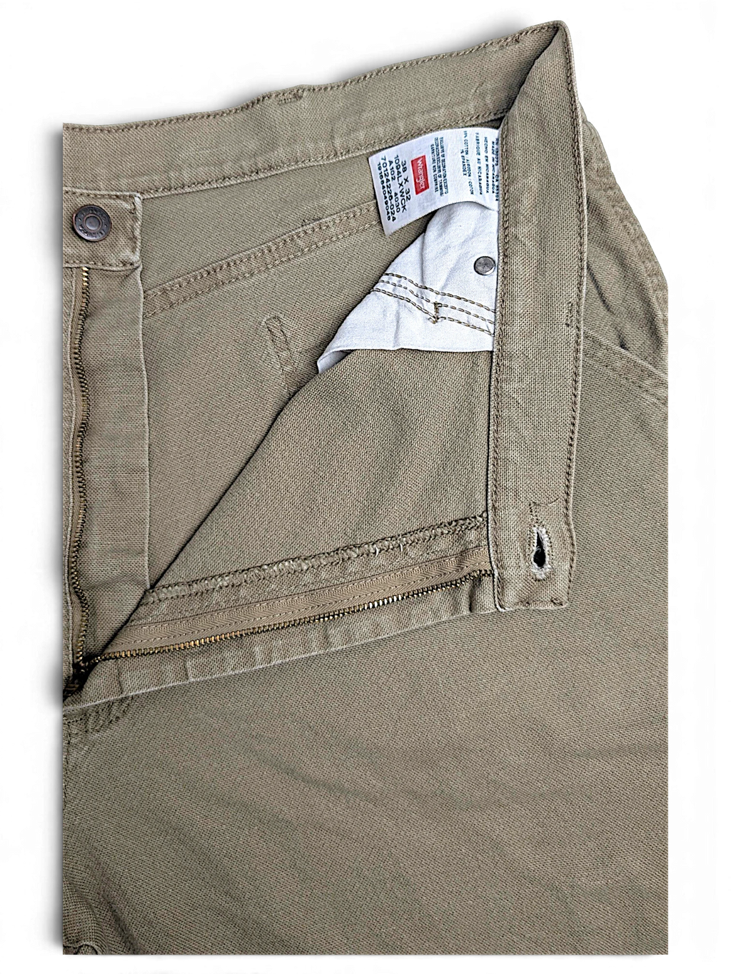 JAKE & IPI Wrangler khaki beige carpenter pants featuring a zip fly and internal care label detail