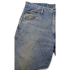 JAKE & IPI Wrangler 96501DS vaaleansiniset farkut, klassinen viisitaskumalli ja metalliniitit.