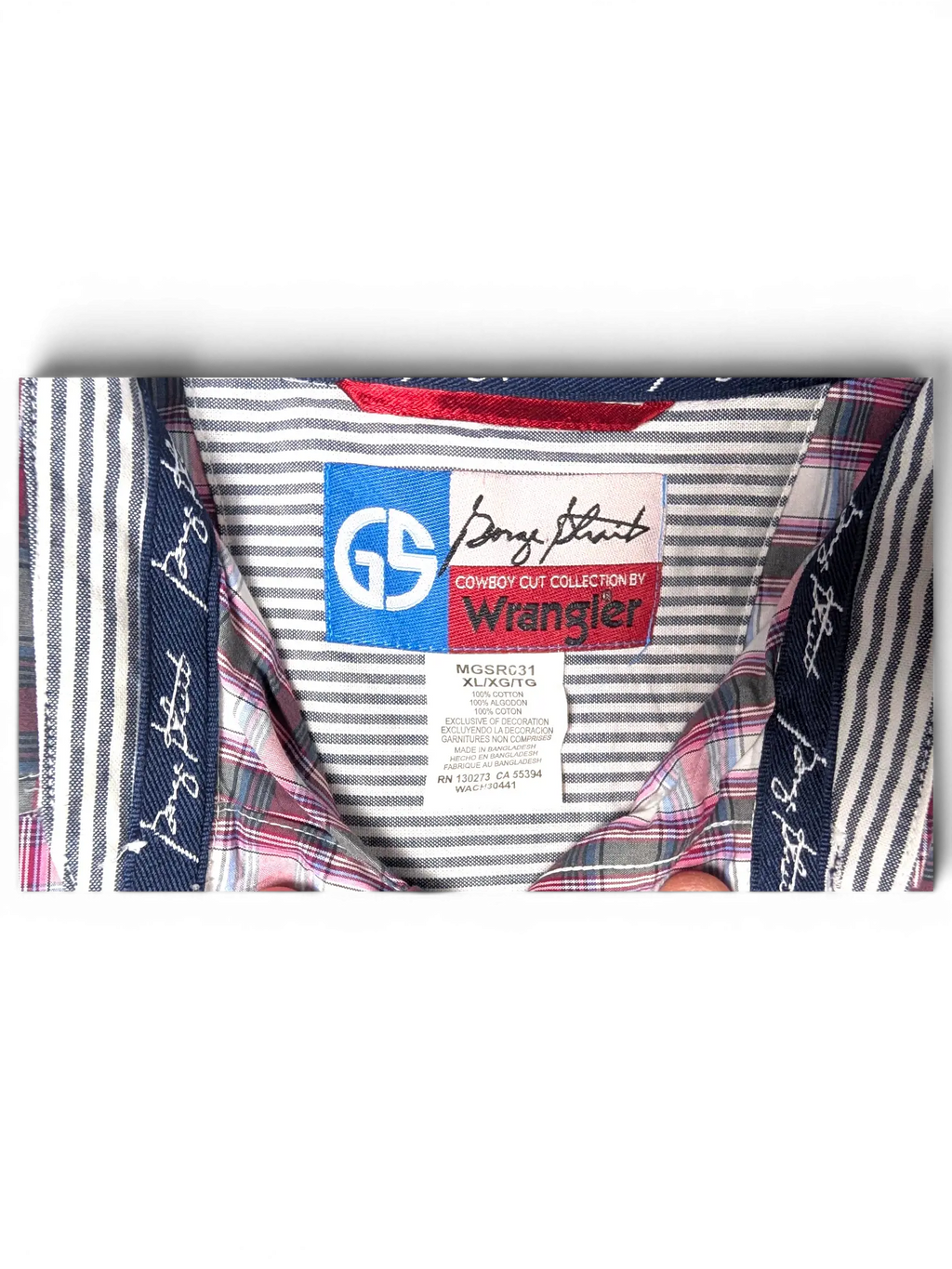 JAKE & IPI vintage Wrangler plaid short sleeve shirt label showing pink, navy, and white cotton fabric details