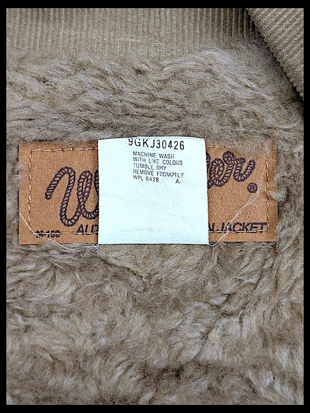 JAKE & IPI vintage Wrangler 80s 90s sherpa jacket interior label with care instructions and tan corduroy collar