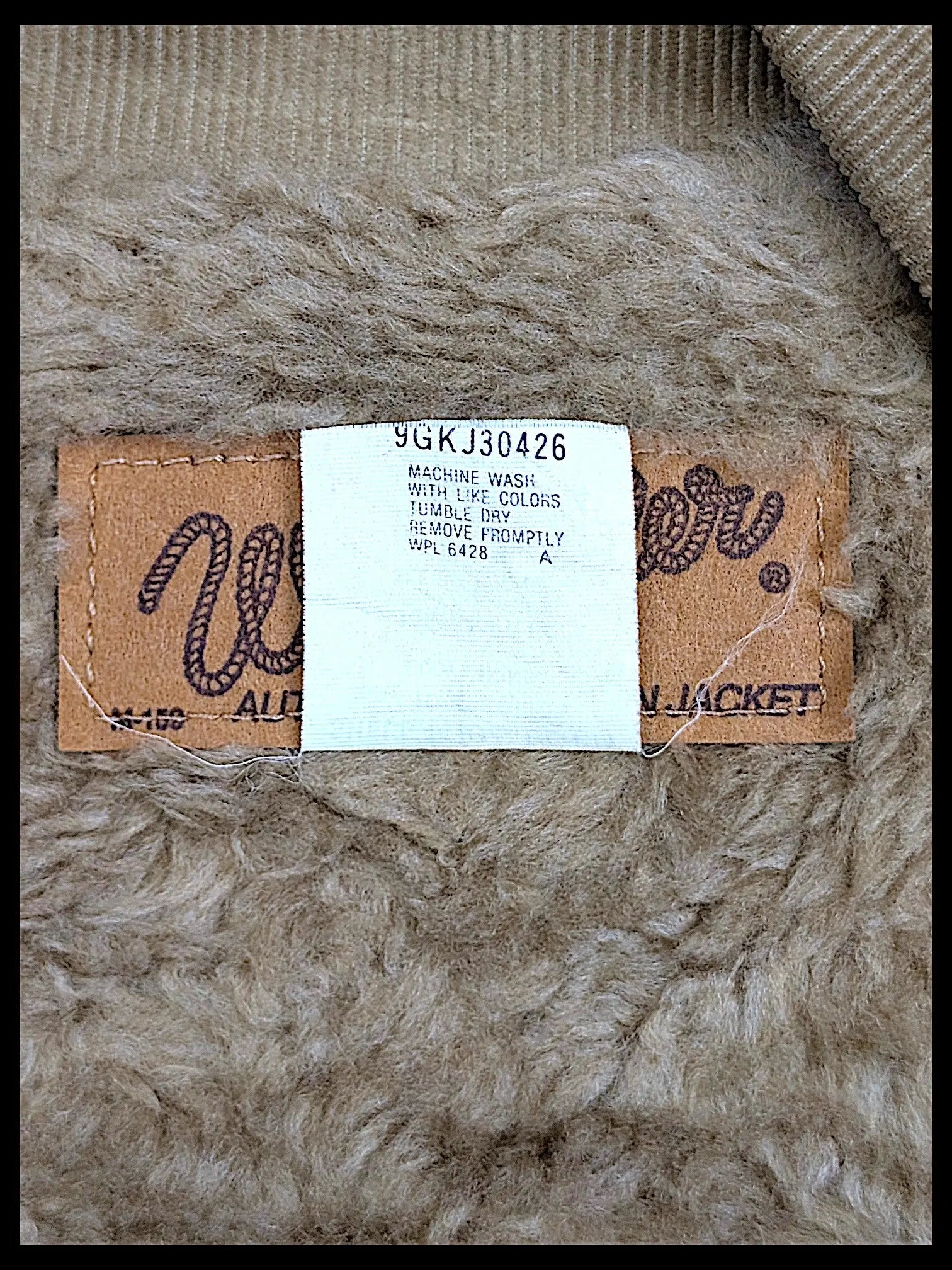 JAKE & IPI vintage Wrangler 80s 90s sherpa jacket interior label with care instructions and tan corduroy collar