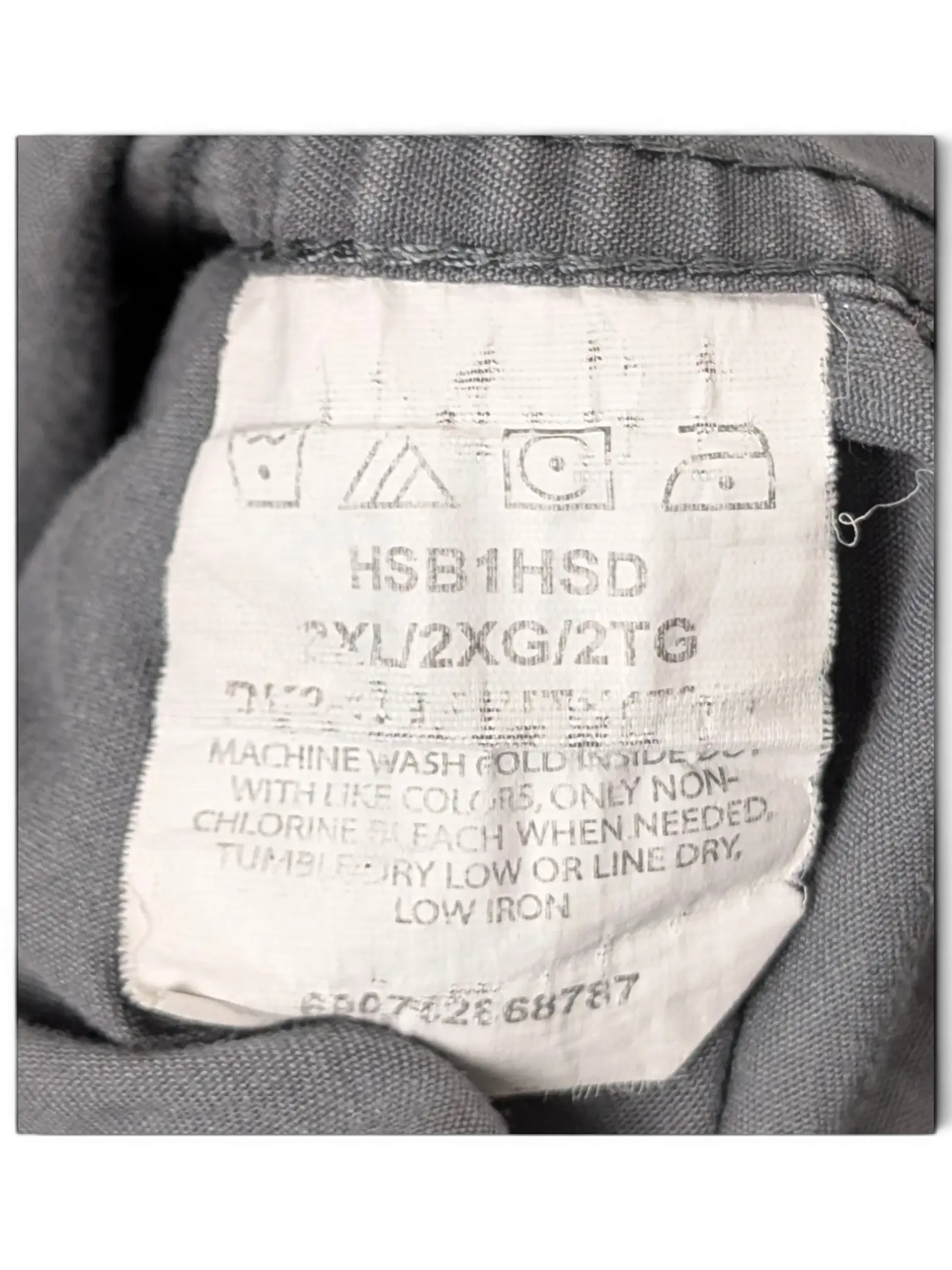 JAKE & IPI Wrangler grey utility shirt care label showing size 2XL and washing instructions