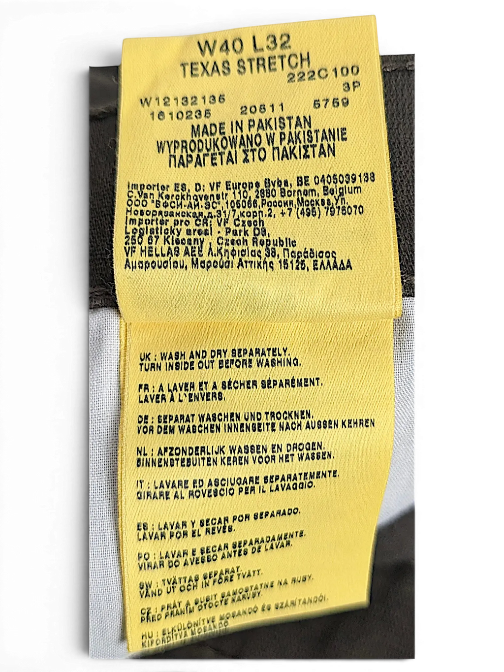 JAKE & IPI Wrangler Texas Stretch pants care label showing size W40 L32 and manufacturing details