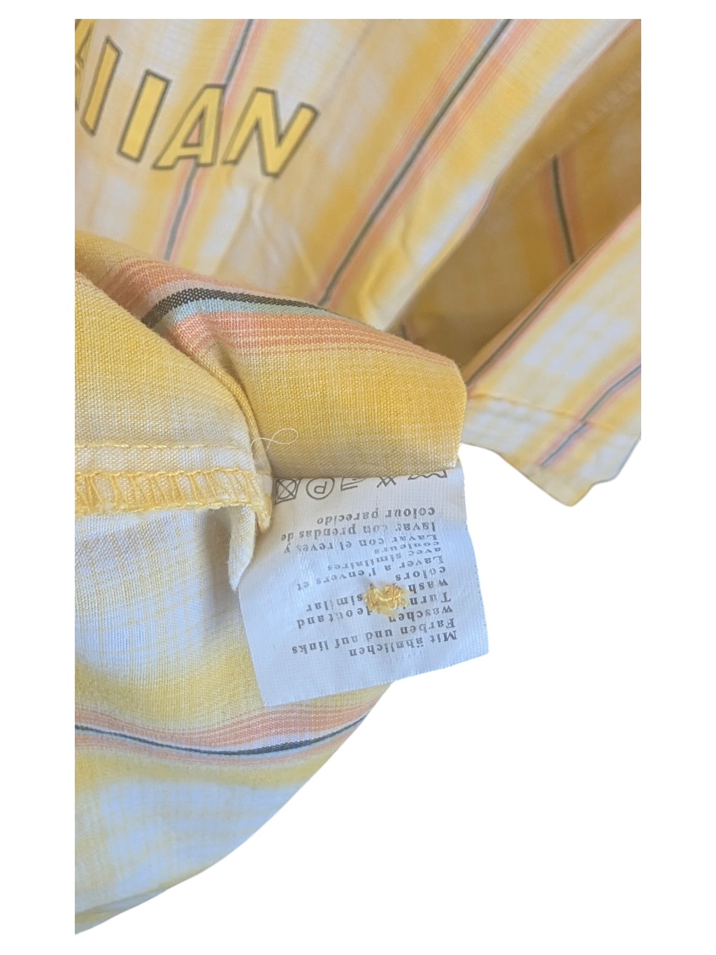 JAKE & IPI yellow Hawaiian shirt with striped pattern and interior care label showing washing instructions