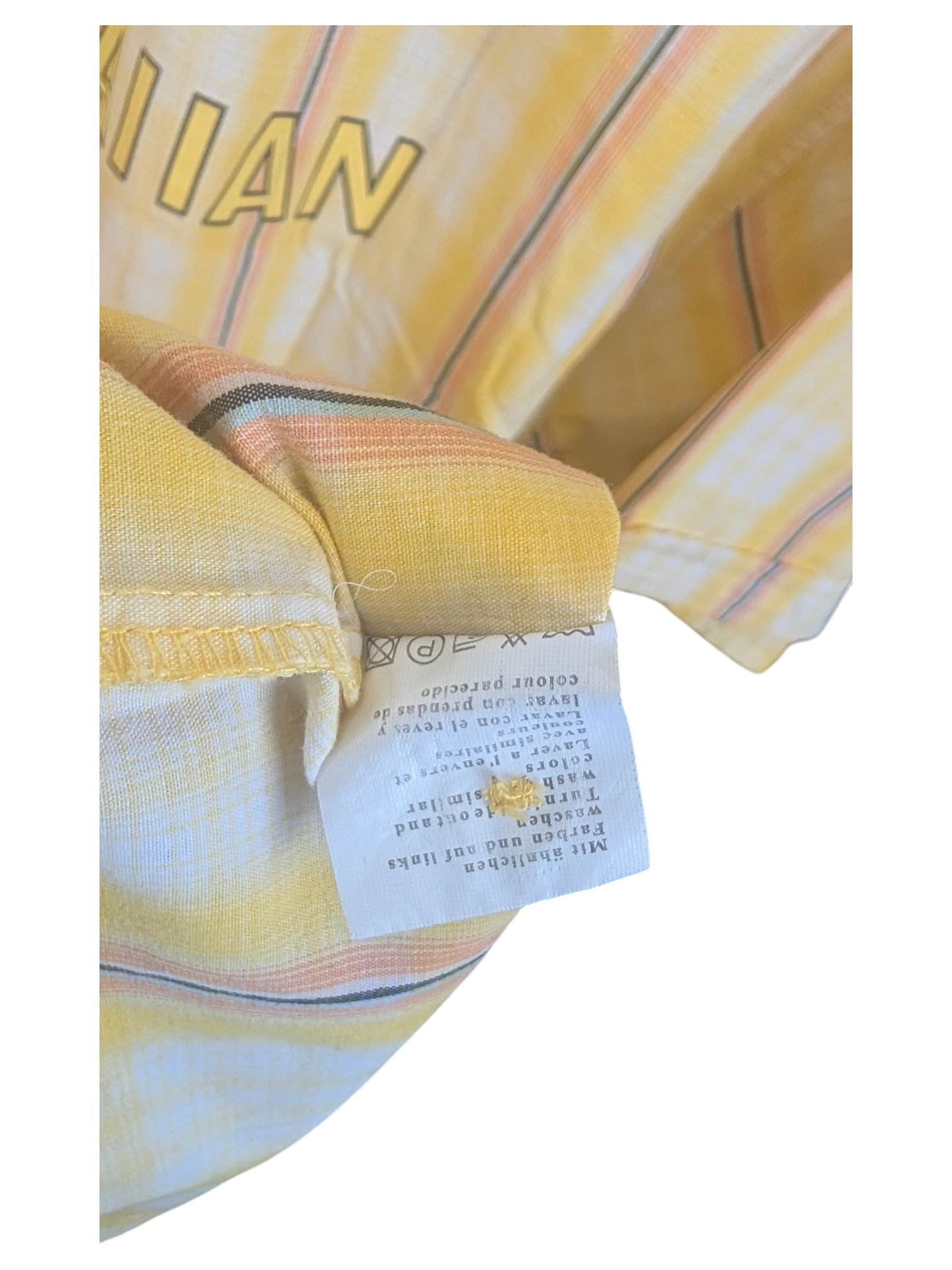 JAKE & IPI yellow Hawaiian shirt with striped pattern and interior care label showing washing instructions
