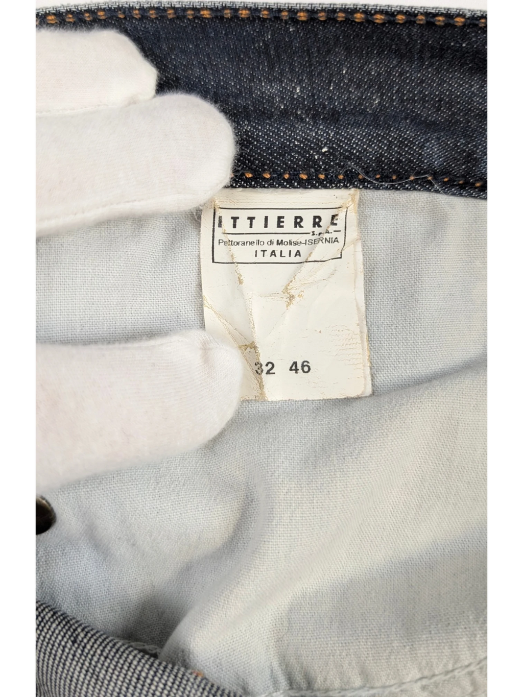 Just Cavalli distressed straight-leg jeans in medium-wash blue denim with contrast tobacco stitching and leather logo patch. Size 32 (IT 46).